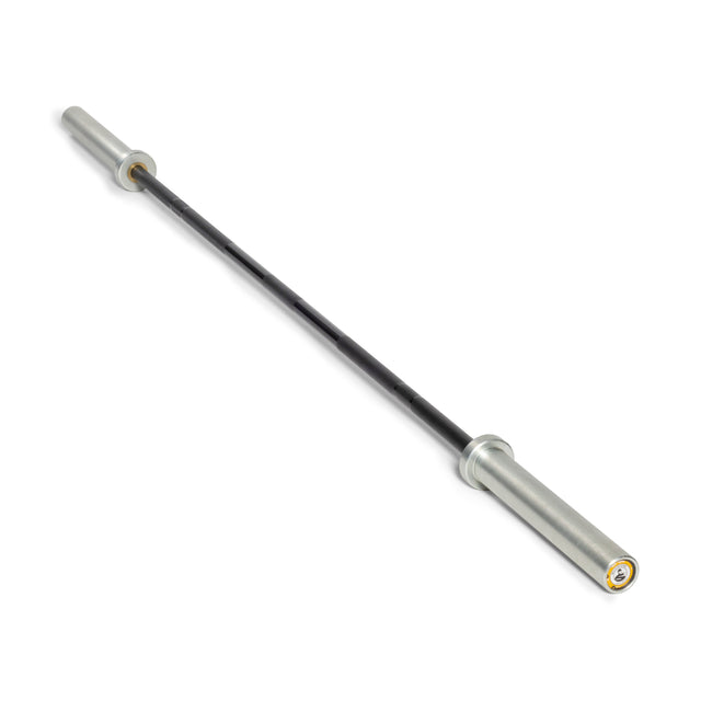 The Bells of Steel Juno Bar - Women’s Utility Bar features silver sleeves and a black textured grip, making it ideal for women’s weightlifting; shown diagonally against a white background.