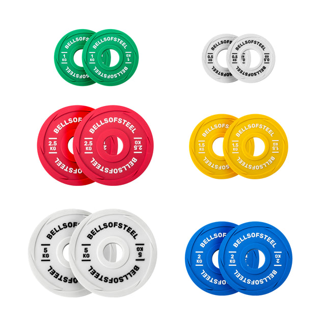 Six pairs of Bells of Steel Urethane-Coated Change Plate Sets in green, black, red, yellow, white, and blue, each plate featuring “BELLSOFSTEEL” and its weight printed clearly.