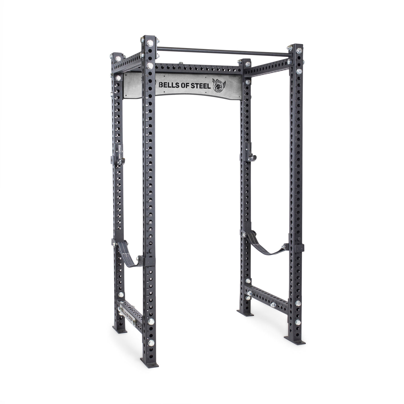The Manticore Four Post Power Rack - Prebuilt by Bells of Steel features 3"x3" uprights, 1" holes for multiple adjustments, two safety straps, a pull-up bar, and a branded frame—ideal for any home gym.