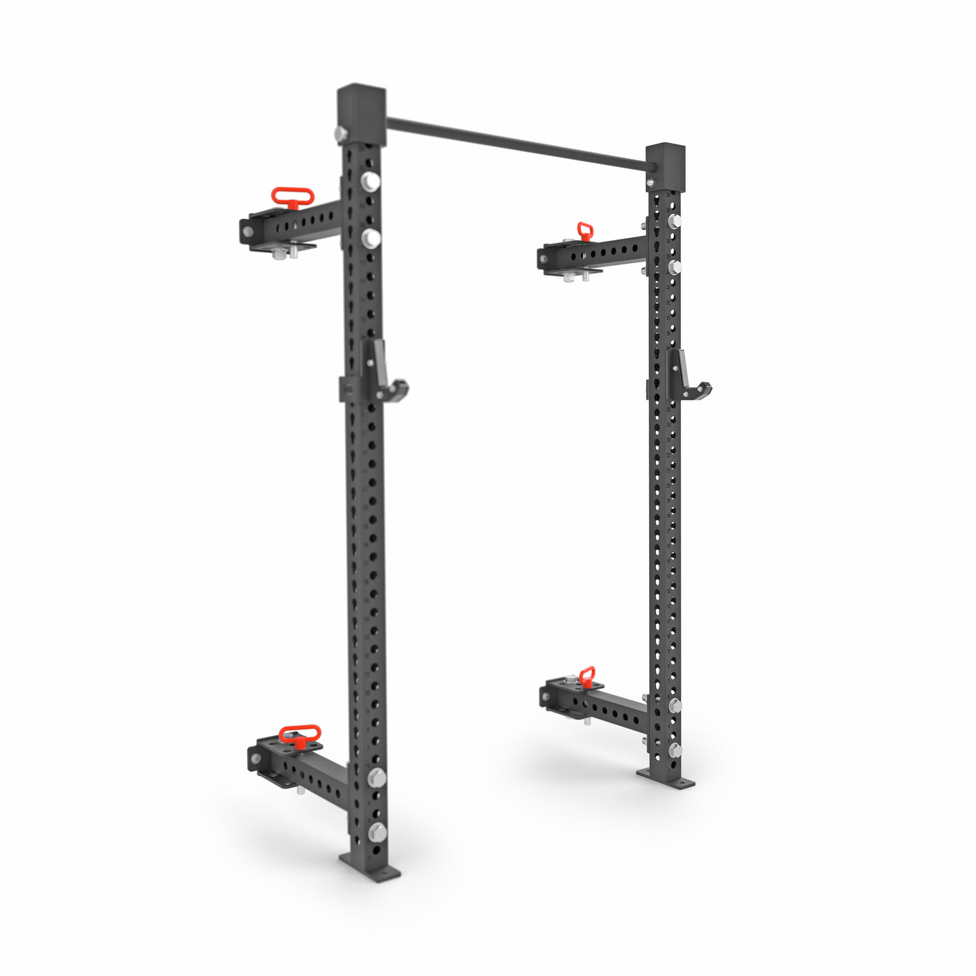 The Bells of Steel Manticore Folding Half Rack (3"x3", 1" holes) is a black metal rack with adjustable safety arms, J-hooks, and a pull-up bar—perfect modular gym equipment for any home gym.