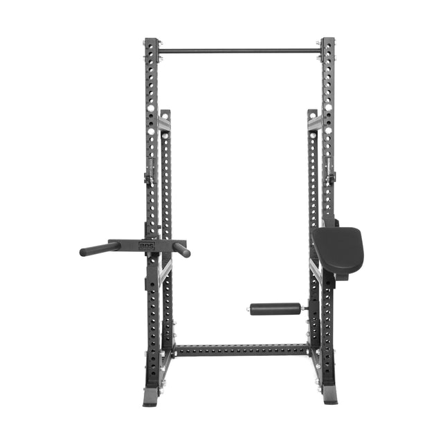 The Bells of Steel Manticore Half Rack Builder (3" x 3", 1" Holes) is a black metal power rack with adjustable safety bars, pull-up bar, dip handles, and padded armrests—ideal for strength training and bodyweight workouts at home.