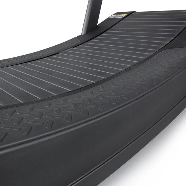 The Bells of Steel Blitz Magnetic Resistance Manual Treadmill features a curved, textured running surface and side rails, ideal for indoor fitness and running, with magnetic resistance for an extra workout challenge.