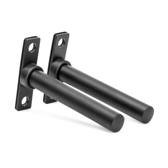 Bells of Steel Bolt-On Plate Pegs are two black metal wall brackets with cylindrical rods and rectangular mounting plates, each with two screw holes, designed for rack-mountable Olympic weight plate storage or shelf support.