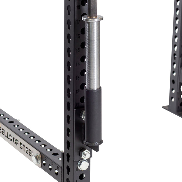 Close-up of the Bells of Steel Vertical Mount Barbell Holder Rack Attachment on a black power rack, demonstrating efficient barbell storage and improved organization.