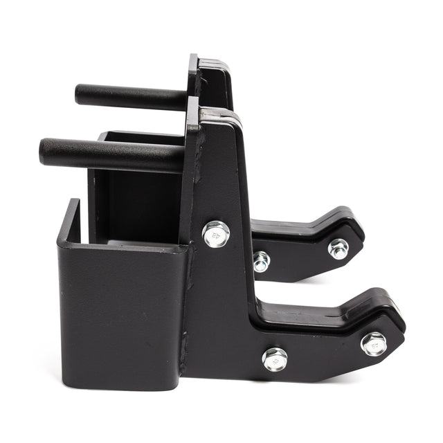 The Bells of Steel Sandwich J-Cups are black metal brackets with bolts and two cylindrical rods, featuring a rectangular holder and angled arms—ideal heavy-duty rack attachments for mounting or lifting mechanisms.