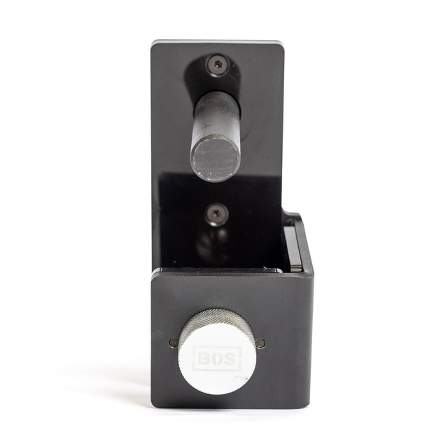 The Bells of Steel Roller J-Cups are black metal tool holders with durable nylon rollers, a round silver adjustment knob, and a cylindrical handle, shown from the front against a white background.