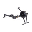 The Blitz Air Rower by Bells of Steel is a black-framed indoor rowing machine with a fan wheel, ideal for low-impact cardio. It includes a sliding seat and footrests, tailored for full-body workouts and fitness training.