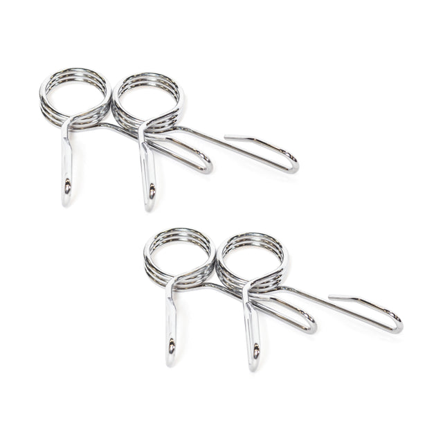 The Bells of Steel Spring Collars feature two metal circular clamps connected by a loop, designed for Olympic barbell sleeves. The polished chrome finish highlights their rounded and angular design, reflecting light against a white background.