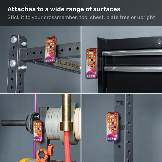 Four images show a phone with an orange case securely attached to various metal surfaces—such as gym equipment and a tool chest—using the Bells of Steel USA Selfie Sentinel - Magnetic Rack Phone Holder. Text above reads: “Attaches to a wide range of surfaces.”.