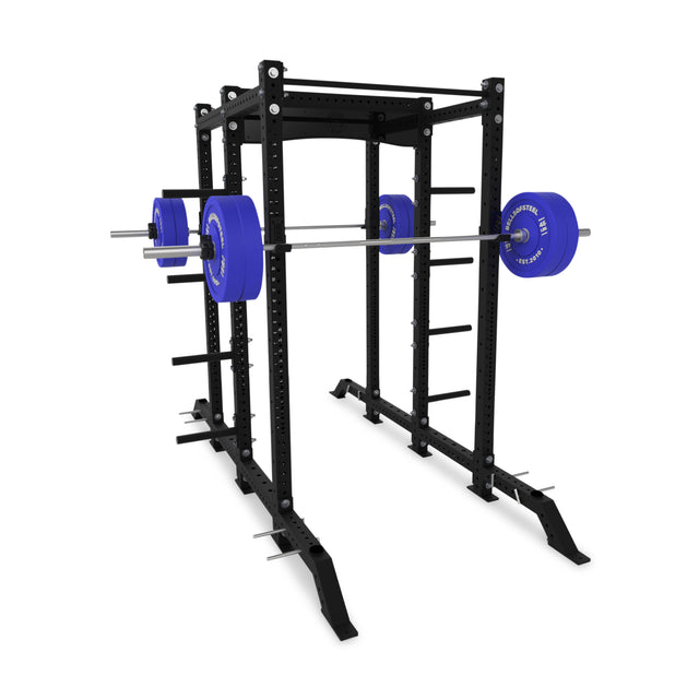 The Bells of Steel Hydra 2-Sided Rack in black is set up with a loaded barbell and blue plates, featuring multiple adjustment holes and safety bars—perfect for any modular home gym.
