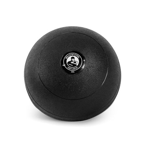 A black Bells of Steel slam ball with a textured surface and a circular label featuring the brand logo and weight info, ideal for strength training, cardio workouts, and enhancing explosive power during fitness exercises.