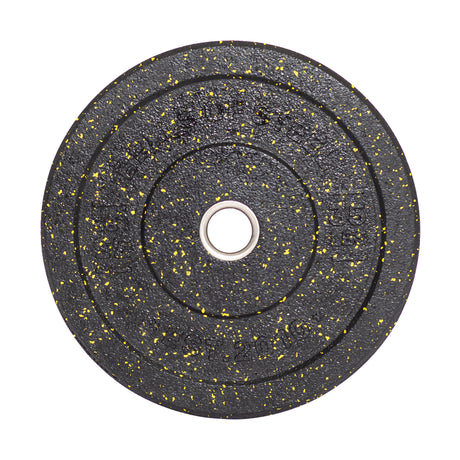 Close-up of a Bells of Steel Crumb Bumper Plate, featuring a round black design with yellow specks and a central hole, perfect for weightlifting or enhancing your lifting game.