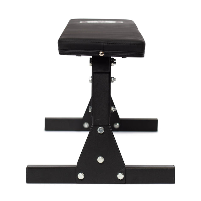 The Bells of Steel Flat Utility Bench, shown from the front with a sturdy metal frame and padded seat, supports up to 661 lbs. This budget-friendly bench is featured against a white background.