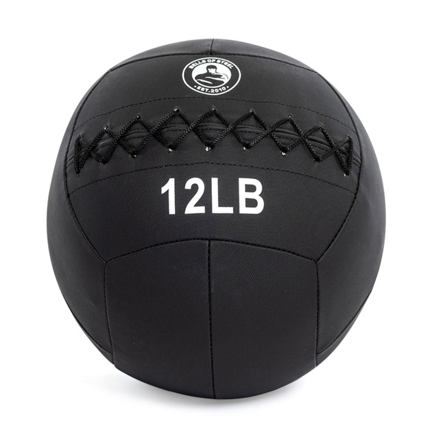 The Bells of Steel Triple Stitched Medicine Ball, available in black and multiple weight sizes like 12 pounds, features prominent stitching and a logo with a sitting silhouette. Made from durable Kevlar, it's perfect for rigorous workouts.