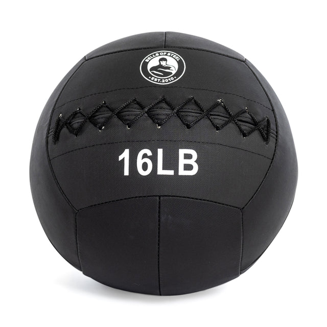 The Bells of Steel Triple Stitched Medicine Ball is black with "16LB" and a stylized fist logo surrounded by "Balls of Steel Est. 2010." Made with durable Kevlar and triple stitching, it comes in multiple weights for versatile workouts.