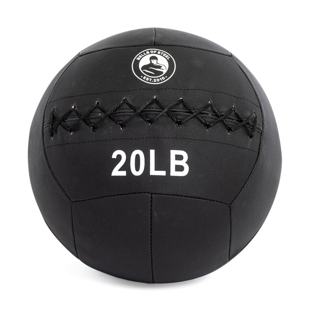 The Bells of Steel Triple Stitched Medicine Balls are durable, 20-pound black medicine balls with visible stitching and a "BELLS OF STEEL EST. 2010" logo, designed for all fitness levels.