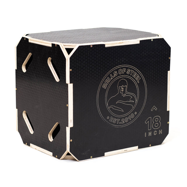 The Bells of Steel 3 in 1 Anti-Slip Wood Plyo Box features a black finish, angled cutout handles, a grippy textured surface, and the "Bells of Steel 18 inch" logo—perfect anti-slip gym equipment for your home gym.