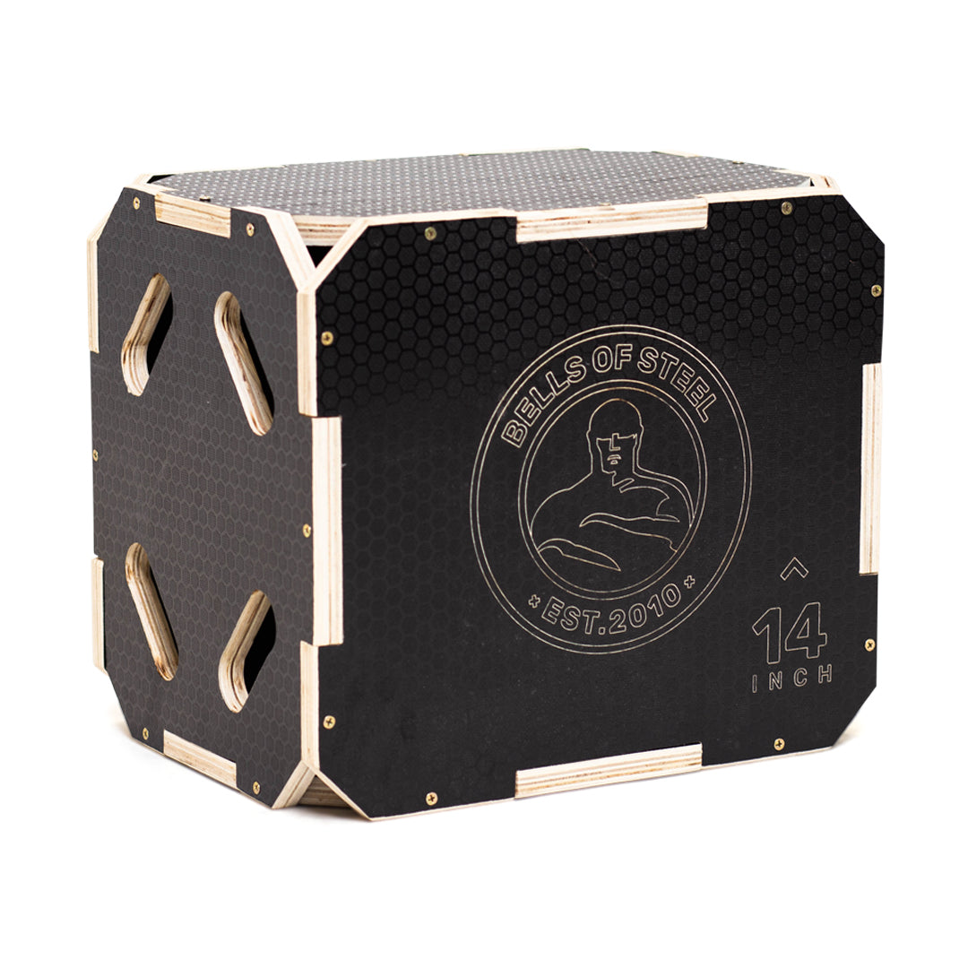 The Bells of Steel 3 in 1 Anti-Slip Wood Plyo Box features cut-out handles, a hexagonal textured surface for grip, and “14 inch” marking—perfect gym equipment for any home workout space.