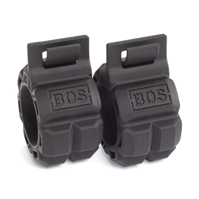 Two black, cylindrical rubber grips with textured surfaces and “Bells of Steel” embossed on each, these Barbell Zip Clips offer a rugged design ideal for improving your exercise or fitness equipment setup.