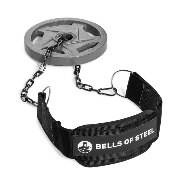The Bells of Steel USA Dip Belt features reinforced stitching, a metal chain to secure round weight plates, and displays the "BELLS OF STEEL" logo on the front—ideal for bodyweight training.