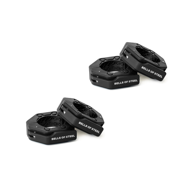 Four black Bells of Steel Magnetic Clamp Collars, each hexagonal with white branding, are arranged in two pairs on a white background.