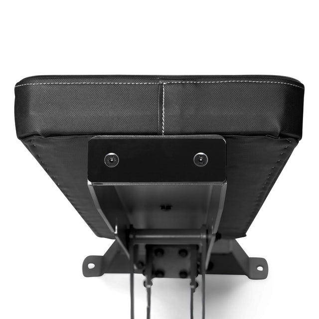 Close-up of the end of a Bells of Steel Buzz-Saw Heavy-Duty Adjustable Bench, showing black padded upholstery with visible stitching and sturdy metal support brackets, set against a white background.