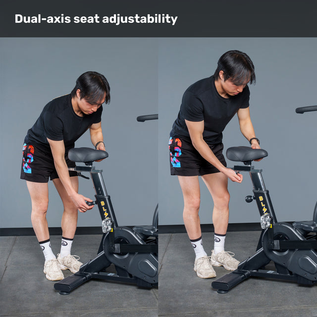 Wearing athletic gear, a person adjusts the seat height and angle of the Bells of Steel Blitz Air Bike, showing its dual-axis seat adjustability—an ideal addition to your home gym. The text "Dual-axis seat adjustability" appears at the top.