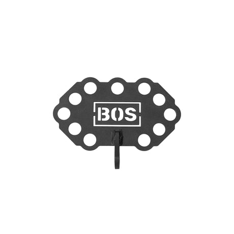 A black metal target plate with multiple circular holes around the edge, "Bells of Steel USA" in a white box at the center, and a Kaizen Multi-Link mounting bracket at the bottom.