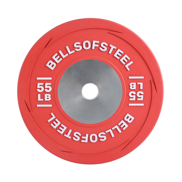 A top-down view of the Bells of Steel Boltless LB Competition Bumper Plate, a red 55 lb plate with "BELLSOFSTEEL" in white around the center. Built to IWF specs, it’s perfect for serious Olympic lifting.