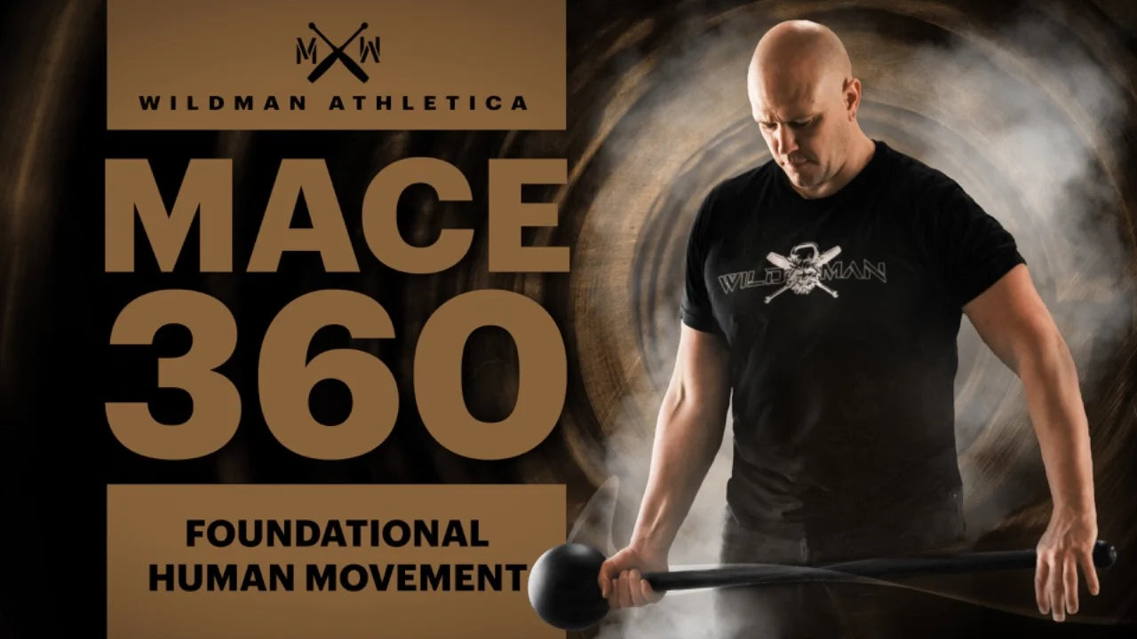 A man in a black shirt holds a mace, demonstrating rotational strength with the text "Mark Wildman Mace 360s - Bells of Steel USA" and the Bells of Steel USA logo displayed in the background.