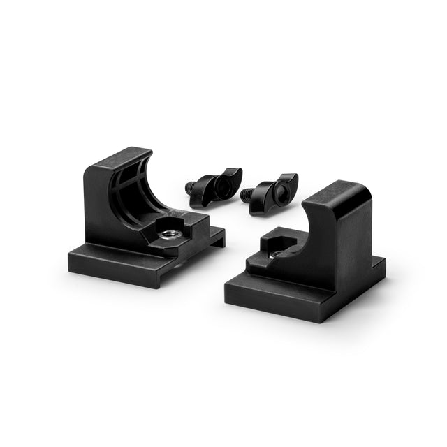 Two black L-shaped plastic brackets with screws and wing nuts, shown on a white background. Designed for use with the Bells of Steel USA NÜOBELL-S Floor Stand, ideal for mounting or securing objects.