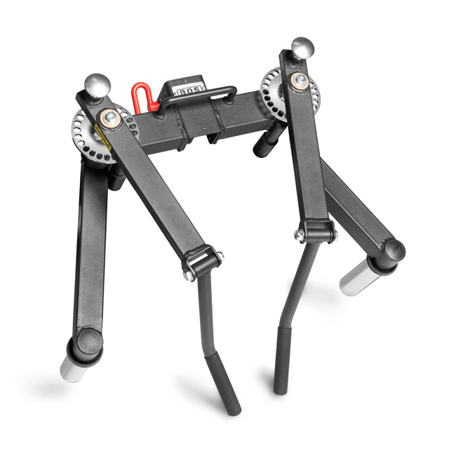 A black metal Bells of Steel Shoulder Boulder/Chest Fly Attachment with adjustable legs and silver round feet, designed for rack mounting, is shown against a white background.