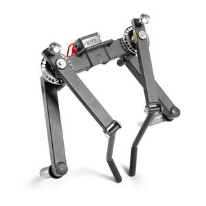 The Bells of Steel Shoulder Boulder/Chest Fly Attachment is a compact black metal device with adjustable arms, gears, and two bottom handles. Labeled "BOS," it’s a space-saving gym tool and dumbbell alternative for effective shoulder workouts.