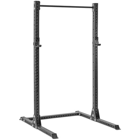 Black metal squat rack with adjustable height holes, two upright posts, a pull-up bar at the top, and a sturdy base for stability, designed for weightlifting exercises in gyms or home use.