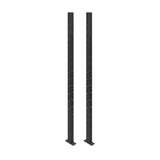 Two tall, black Hydra Vertical Uprights by Bells of Steel with multiple evenly spaced holes, each mounted on a flat rectangular base.