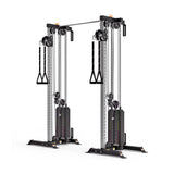 The Bells of Steel Cable Tower Squat Stands features dual weight stacks, pulleys, and adjustable handles within a sleek metallic frame with black and silver elements, making it an essential piece for strength training in any home gym.