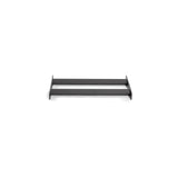 The Bells of Steel Bumper Plate Pins Shelf, a minimalist horizontal black shelf with two levels, is perfect for organizing and mounts beautifully on a white wall.