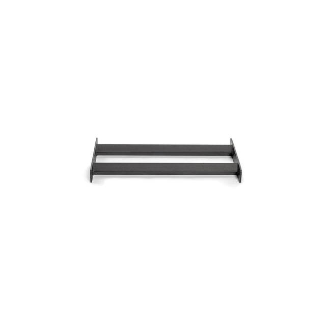 The Bells of Steel Bumper Plate Pins Shelf, a minimalist horizontal black shelf with two levels, is perfect for organizing and mounts beautifully on a white wall.