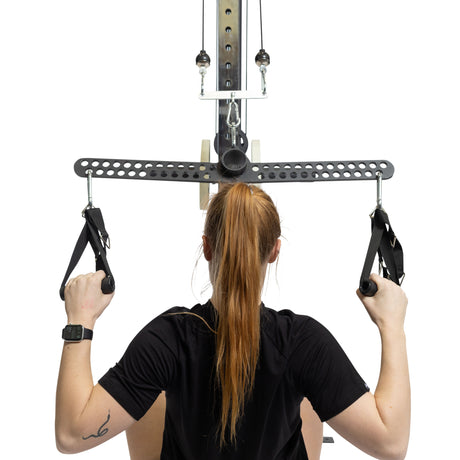 Female athlete doing lat pulldowns with 30 D-Handle Bar Cable Attachment with Carabiners