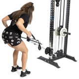 A person in a gym uses the Bells of Steel 30 D-Handle Bar Cable Attachment with Carabiners to perform a bent-over cable row on a cable machine, wearing black t-shirt and shorts.