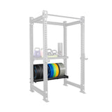 The Bells of Steel USA Storage Shelves hold weight plates and a foam roller, featuring a dumbbell kettlebell shelf. Attached to a translucent power cage, these shelves offer versatile storage for your gym essentials.