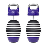 Two shaker instruments in purple and black, featuring ergonomic handles and ribbed designs that evoke the Adjustable Competition Kettlebell from Bells of Steel. Equipped with metallic loops on top for easy gripping, these vertically aligned shakers showcase a modern design perfect for musical use.