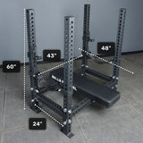 The Bells of Steel USA Manticore Four Post Converter Bench is a black power rack bench station with labeled measurements: 60" tall, 48" wide, 43" deep, and 24" between bottom supports; its floating bench fits inside the frame on a gray floor.