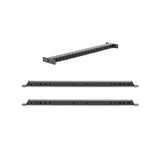 The image features the Bells of Steel Hydra Flat Foot Components—a black, rectangular metal rackmount bracket for Hydra power racks—shown from three angles, each displaying multiple holes for mounting to a flat foot support system.
