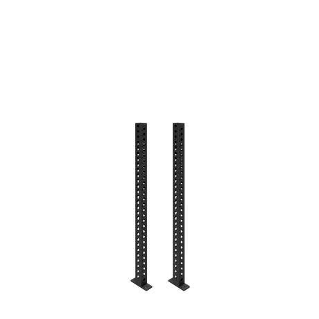 Two black metal Manticore Vertical Uprights by Bells of Steel, each 3x3 with multiple evenly spaced holes, stand parallel on flat bases against a plain white background—ideal for expanding your power rack with compatible attachments.