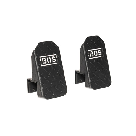 Two black metal hooks with a diamond plate pattern and the white "BOS" logo, designed for wall mounting—perfect as an accessory for the Bells of Steel USA Footplate for Cable Tower/All In One Trainer.