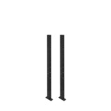 Two black Hydra Vertical Uprights by Bells of Steel, featuring evenly spaced holes and flat bases, stand parallel on a white background, ready for 3x3 power rack attachments.