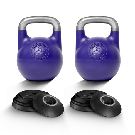 Two Bells of Steel Adjustable Competition Kettlebells with silver handles are displayed behind two sets of three black weight plates each, all arranged on a white background.
