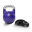 A Bells of Steel Adjustable Competition Kettlebell with a silver handle is positioned beside four stacked black weight plates on a white background.