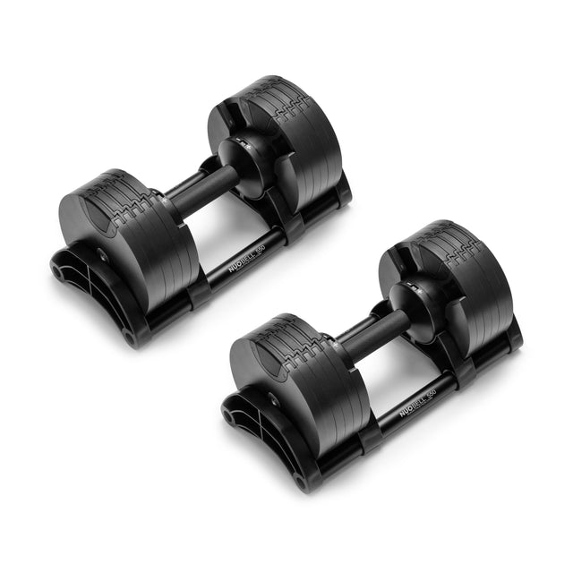 The NÜOBELL Adjustable Dumbbells by Nuobell feature machined steel weight plates in black and a connecting knurled handle, set on a white background. They're ideal for versatile strength training workouts.